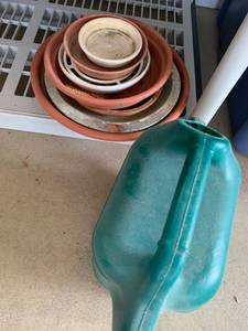 lot 4027 image: Watering can and pot saucers