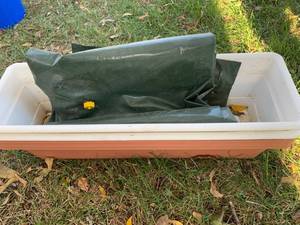 lot 5126 image: 24 x 8 plastic planters and tree watering bag