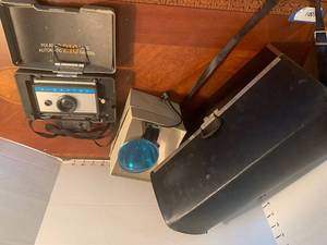 lot 1039 image: Vintage camera with extras. Polaroid 210 automatic land camera