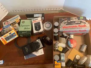 lot 1514 image: Vintage cameras and extras plus film for 35 mm