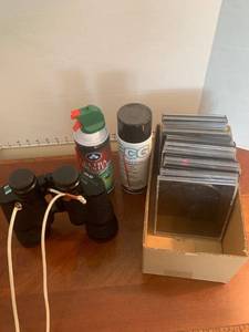lot 1515 image: Mercury binoculars Ultra Duster & Electronics cleaner plus empty CD holders