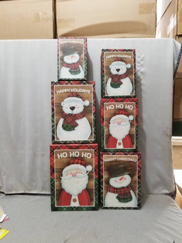 lot 160007 image: Set Of Six Holiday Boxes