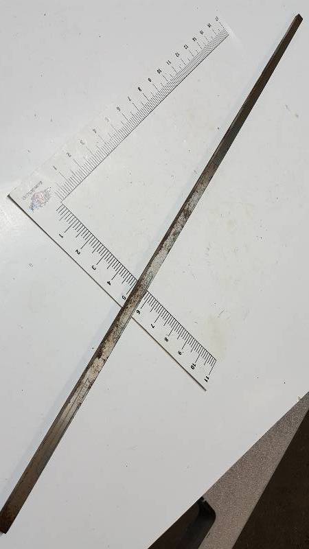 lot 6829 image: 36 long and 12 X 516 machined steel bar or key stock.  Slightly rusty but never used