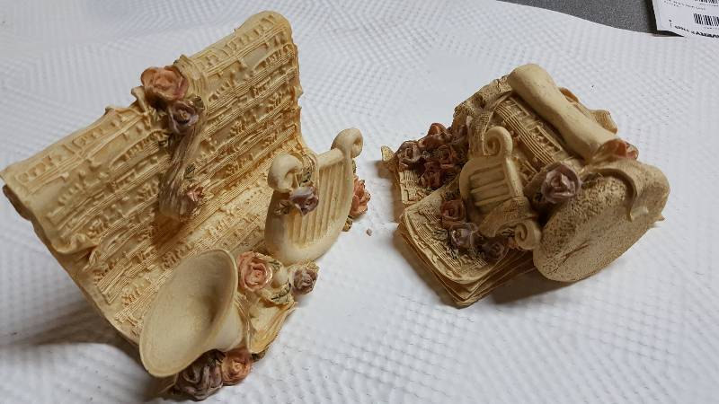 lot 6659 image: Not sure what this matching pair of a desktop letter holder and decorative paper weight are made of but lots of detail and cool looking.