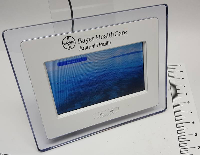 lot 6708 image: Cool digital photo frame designed for a doctors office counter top that features sound, slide show with your photos or videos