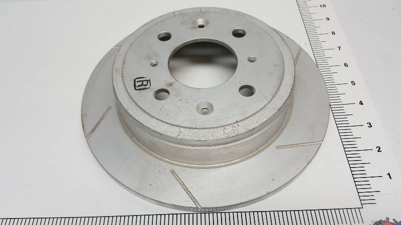 lot 6710 image: Its new but no idea what this 4 lug disc brake rotor hat combination is for.
