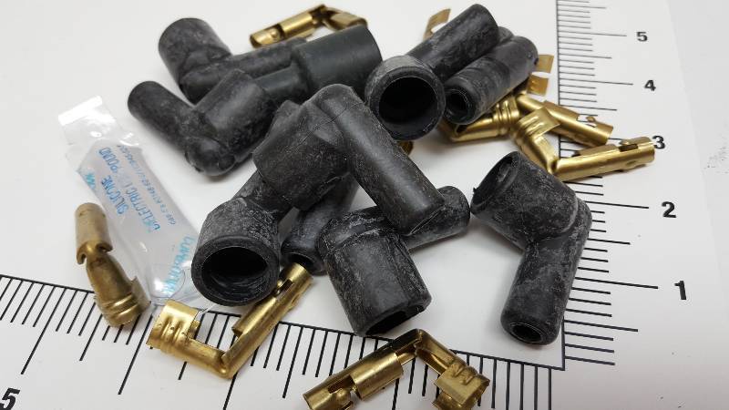 lot 6747 image: New set of distributor brass terminals and spark plug wire 90 degree boots for the earlier socket style 8 cylinder distributor caps