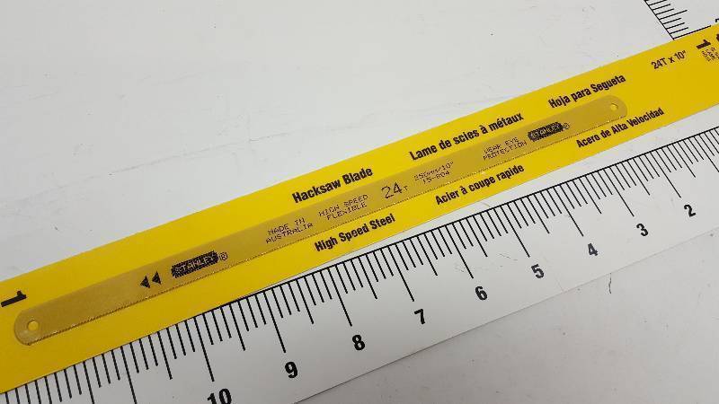 lot 6823 image: New in the hardware store display package is this Stanley high speed steel hacksaw blade 24 tooth X 10 long