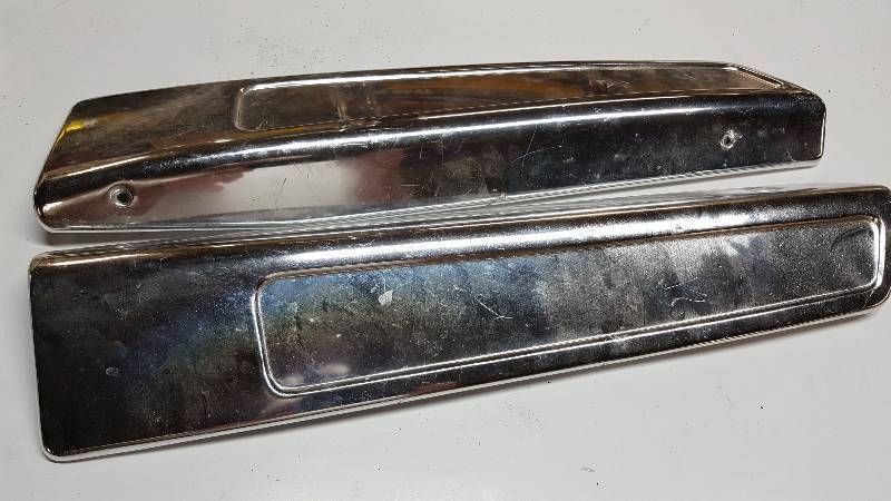 lot 6843 image: Guessing a Ford vehicle bright aluminum front seat base trim