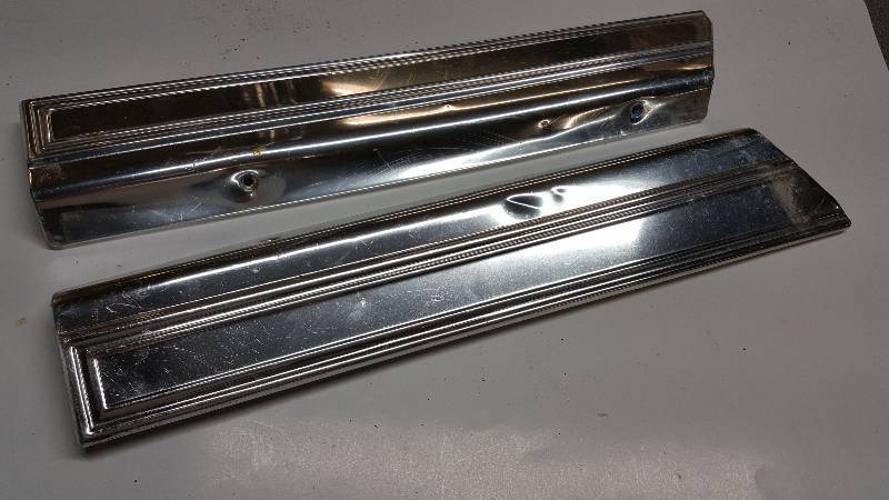lot 6844 image: Guessing a Ford vehicle bright aluminum front seat base trim