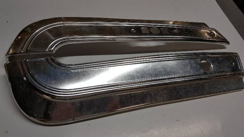 lot 6845 image: Guessing a Ford vehicle bright aluminum front seat base trim