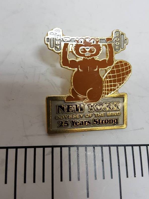 lot 8716 image: Another one of those collectable hat or lapel pins most are finished with wild porcelain colors.