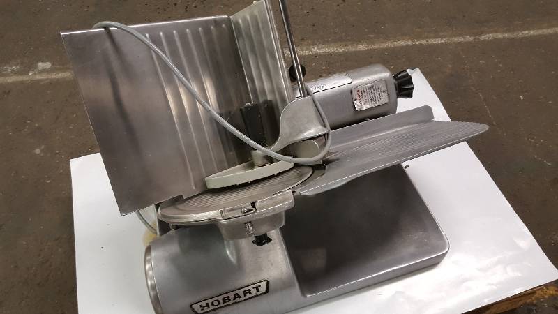 lot 6625 image: Hobart model 1612 meat slicer in excellent shape and with the sharpener.