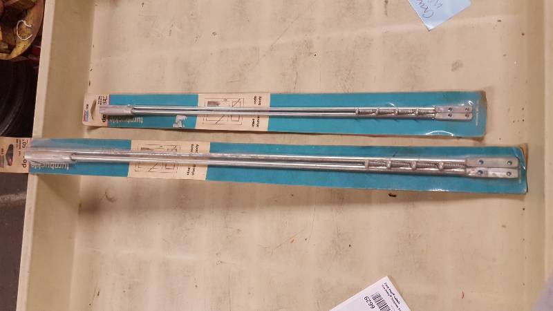 lot 6628 image: Still new in the package are these 2 different lengths of Screen door adjustable square turnbuckles
