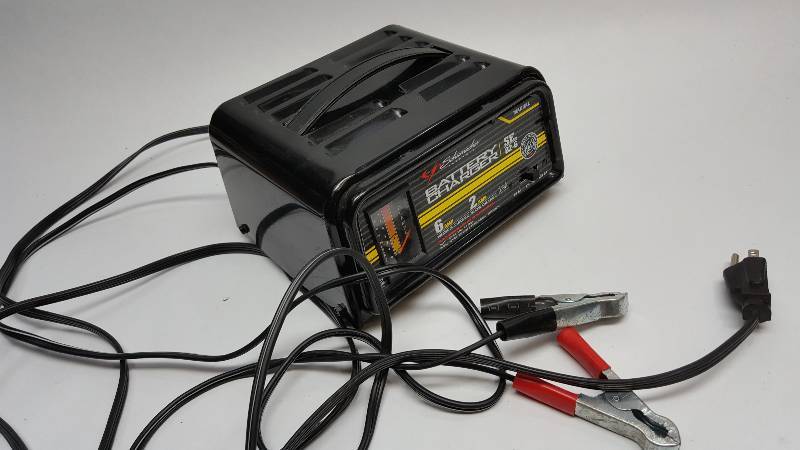 lot 6583 image: In like new condition is this battery charger with lots of options for charging or maintaining your 6 or 12 volt batteries