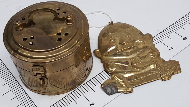lot 6599 image: Incense and candle brass container and happy face decoration