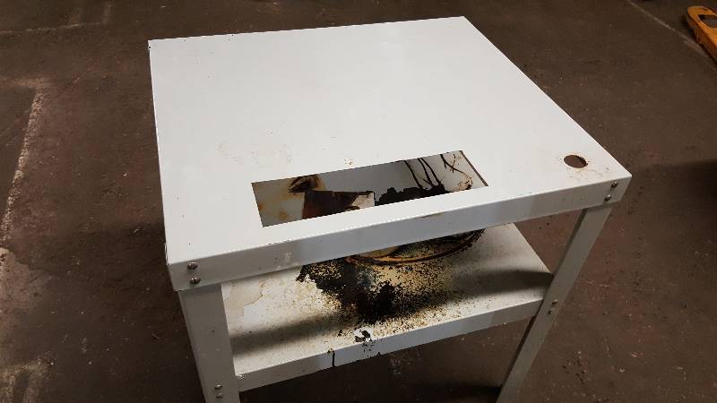 lot 6541 image: All metal and the dark stain I believe to be wax or something pretty easy to clean off.