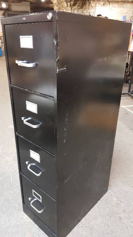 lot 6555 image: 4 drawer filing cabinet Black All metal and actually in very nice shape except for a slight ding and scratch shown in the photos