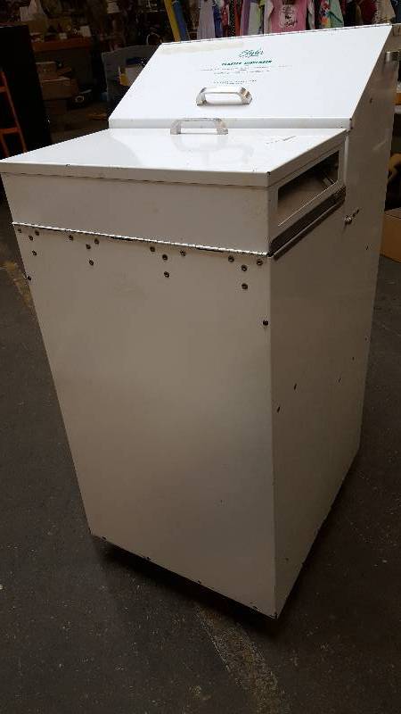 lot 6559 image: Wow what a deal here.  If you ever wanted to be or are in the broken limb cast business, this cool metal fold out on wheels metal cabinet
