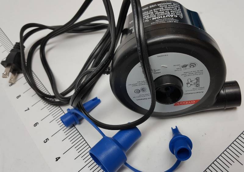 lot 6657 image: New and with the fitting adapters is this Sidewinder AC Air Pump that provides an easy and convenient way to inflate
