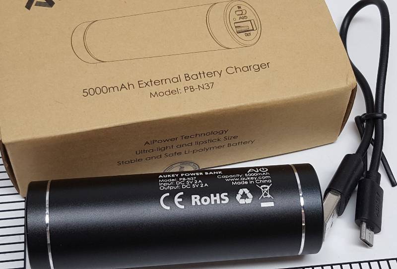 lot 6817 image: New in the box Black AUKEY power bank 5000mAh Portable Charger for iPhone iPad Samsung & More