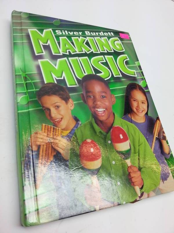 lot 9042 image: Over 400 pages of Making Music information and fun things to do and sing in this Green Cover book.