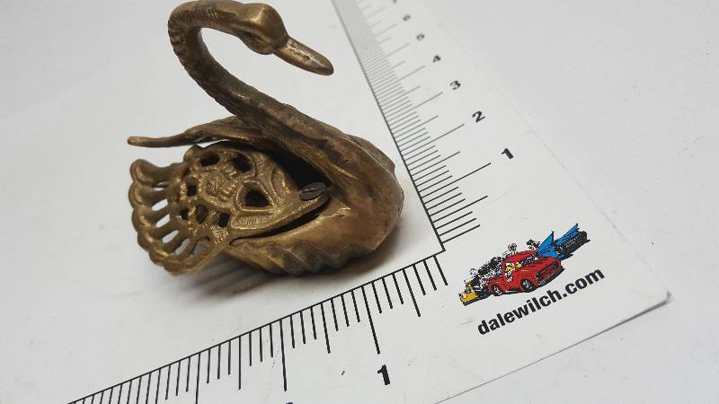 lot 6568 image: Wild looking brass swan with wings to cover up for decoration is actually an ash tray