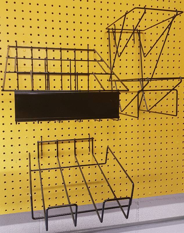 lot 6539 image: A group of 3 different wire literature display racks for peg board mounting.