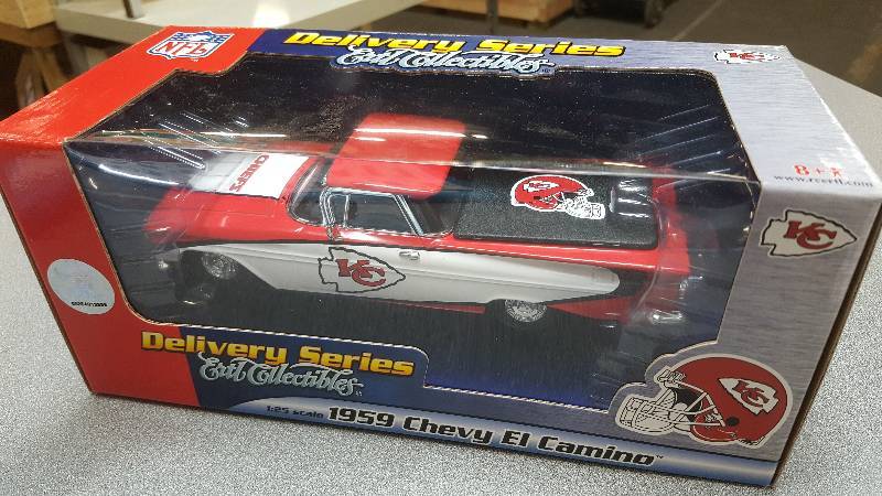lot 6450 image: New in the original box is this 125 scale Ertl Collectables 1959 Chevy El Camino KC Chiefs commemorative delivery series.