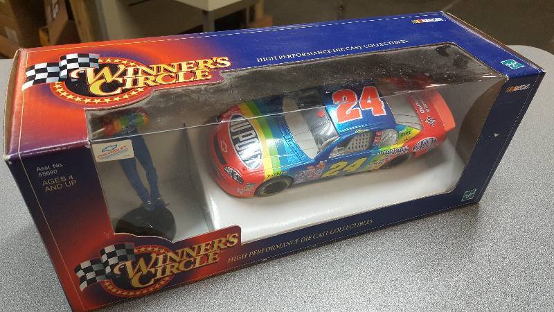 lot 6451 image: New in the original box is this 143rd scale Winners Circle Collectables Jeff Gordon Million $ Winner  Darlington.