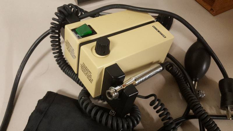 lot 6461 image: Welch Allyn 74710 Wall Transformer Opthalmoscope With Two Heads.