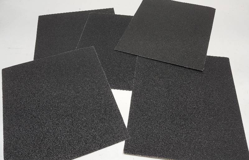 lot 6478 image: 5 package of the 9 X 11 GatorGrit 50 Emery Cloth use it in squares or strips.  Take the material off metal fast