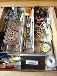 All contents of drawer. Kitchen utensils