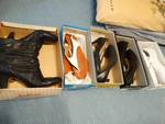 Various pairs of Ladies shoes in boxes.