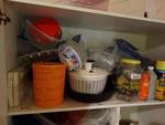 Tupperware, glass jug, various cleaning/chemicals.