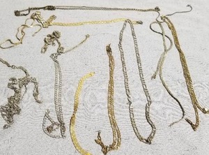 lot 51347 image: Lot Of Necklaces With Metal Box