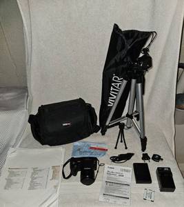 lot 120 image: Working Canon digital camera and accessories
