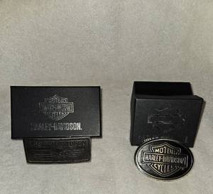 lot 169 image: Harley Davidson belt buckles