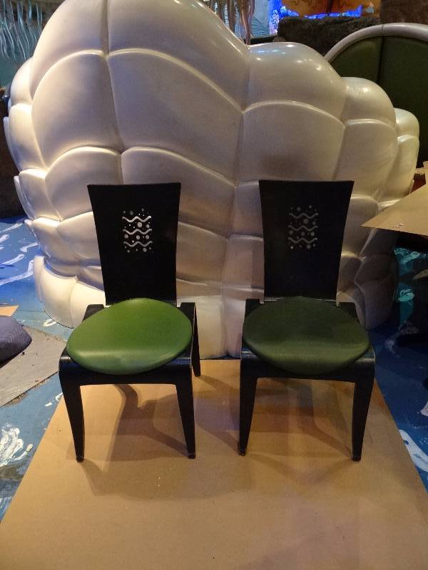 lot 4261T image: Pair of Wooden Framed Green Vinyl Padded Chairs