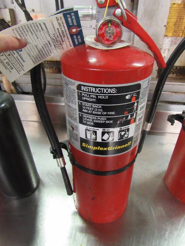 lot 5583 image: Simplex Grinnell ABC Fire Extinguisher