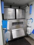 Dual Manitowoc 3000 Lb Capable Air Cooled Ice Makers On Single Large Capacity Stainless Bin