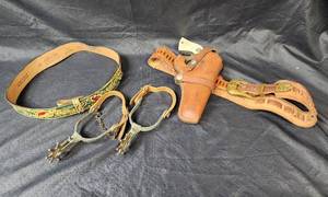 lot 194 image: Hand Painted Leather Belt (size 28), Leather Belt and Holster with Toy Gun, and Stirrups