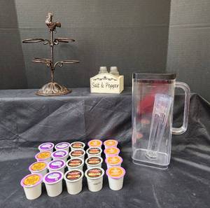 lot 217 image: Keurig K-cups, Keurig Replacement Pitcher, Rooster Cupcake Holder, and Salt and Pepper Shakers