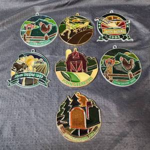 lot 230 image: (7) John Deere Stained Glass Ornaments