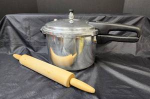lot 180 image: Mirro Pressure Cooker and Rolling Pin