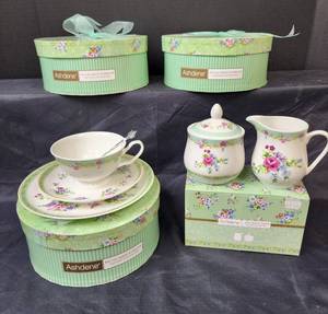 lot 294 image: (3) NIB Ashdene Fine Bone China Teacup, Saucer, Bread Plate, Spoon, and a Cream and Sugar Set (The Kensington Collection)