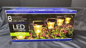 lot 332 image: NIB (8pk.) Decorative Outdoor Garden LED Path Lights