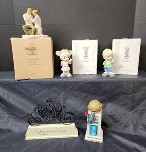 lot 334 image: NIB Willow Tree Around You Cake Topper, NIB Precious Moments Boy and Girl Dad Youre Awesome, Superman Daily Calendar, and Cinderella Decor