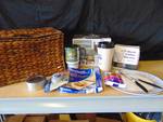 (9) ct. lot housewares in woven basket; plate, insulated mugs, baking liners