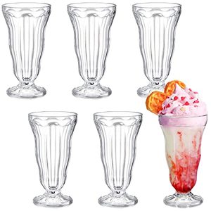 lot 1159 image: 6 Pack Acrylic Milkshake Glasses, 15 OZ Clear Old Fashioned Soda Glass, Shatterproof Footed Ice Cream Cups, Plastic Pina Colada Fountain Glasses, Great for Juice, Tropical Drinks, Party Retail $25.76